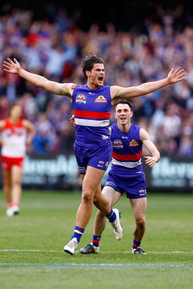 AFL 2016 Toyota AFL Grand Final - Sydney v Western Bulldogs MELBOURNE, AUSTRALIA - OCTOBER 01: Tom Boyd of the Bulldogs celebrates a goal during the 2016 Toyota AFL Grand Final match between the Sydney Swans and the Western Bulldogs at the Melbourne Cricket Ground on October 01, 2016 in Melbourne, Australia. (Photo by Darrian Traynor/AFL Media)